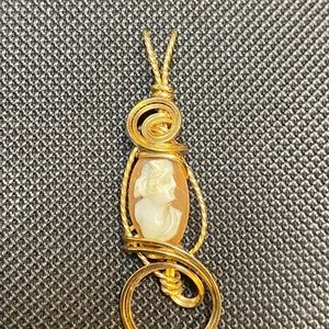 Gold wire, and cameo pendant